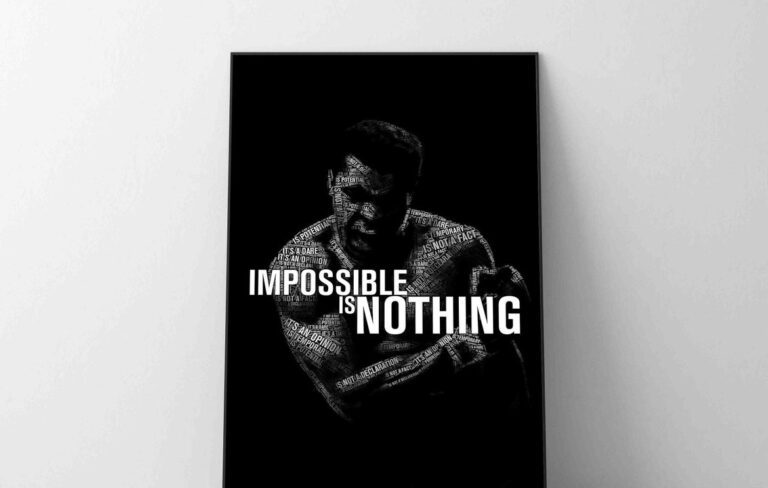 Image of a man in boxing gloves in front of text that says "Impossible is Nothing".
