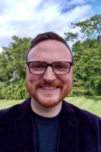 Photo of Dr. Nic Helms (they/them).