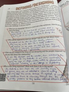 Photo of a completed worksheet titled Defining/Designing.